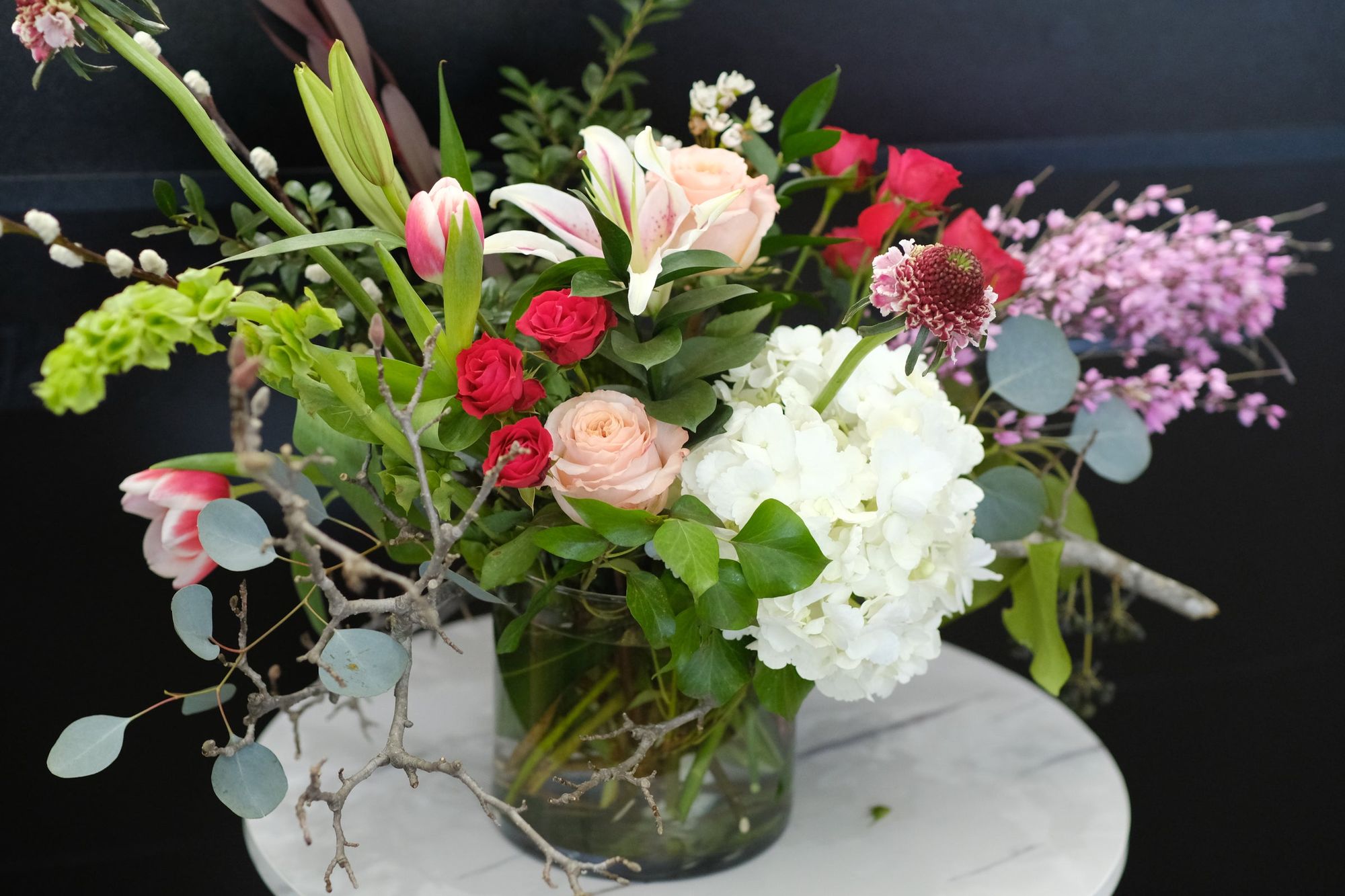 A colorful flower arrangement by Eufloria